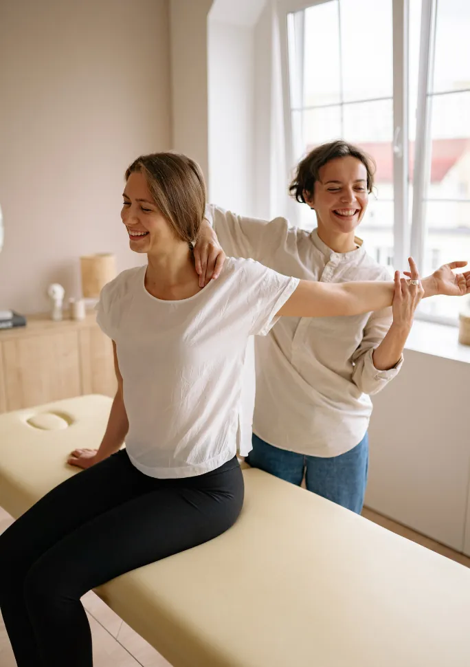 Physical therapist guiding a patient through a treatment session