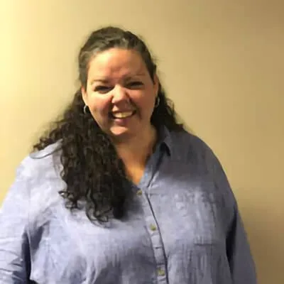 Portrait of Annie Comcowich, Client Care Coordinator at Impact Physio