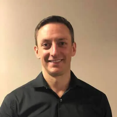 Portrait of John Salva, founder of Impact Physio